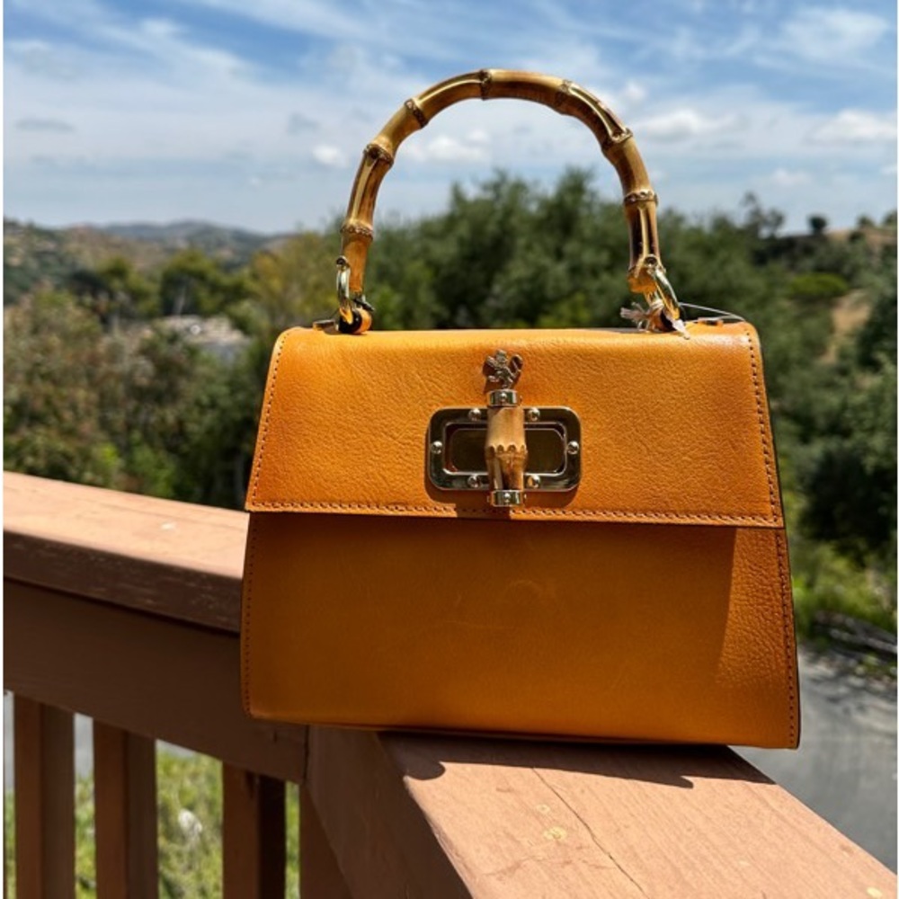 Elegant Yellow Shoulder Bag with Bamboo Handle